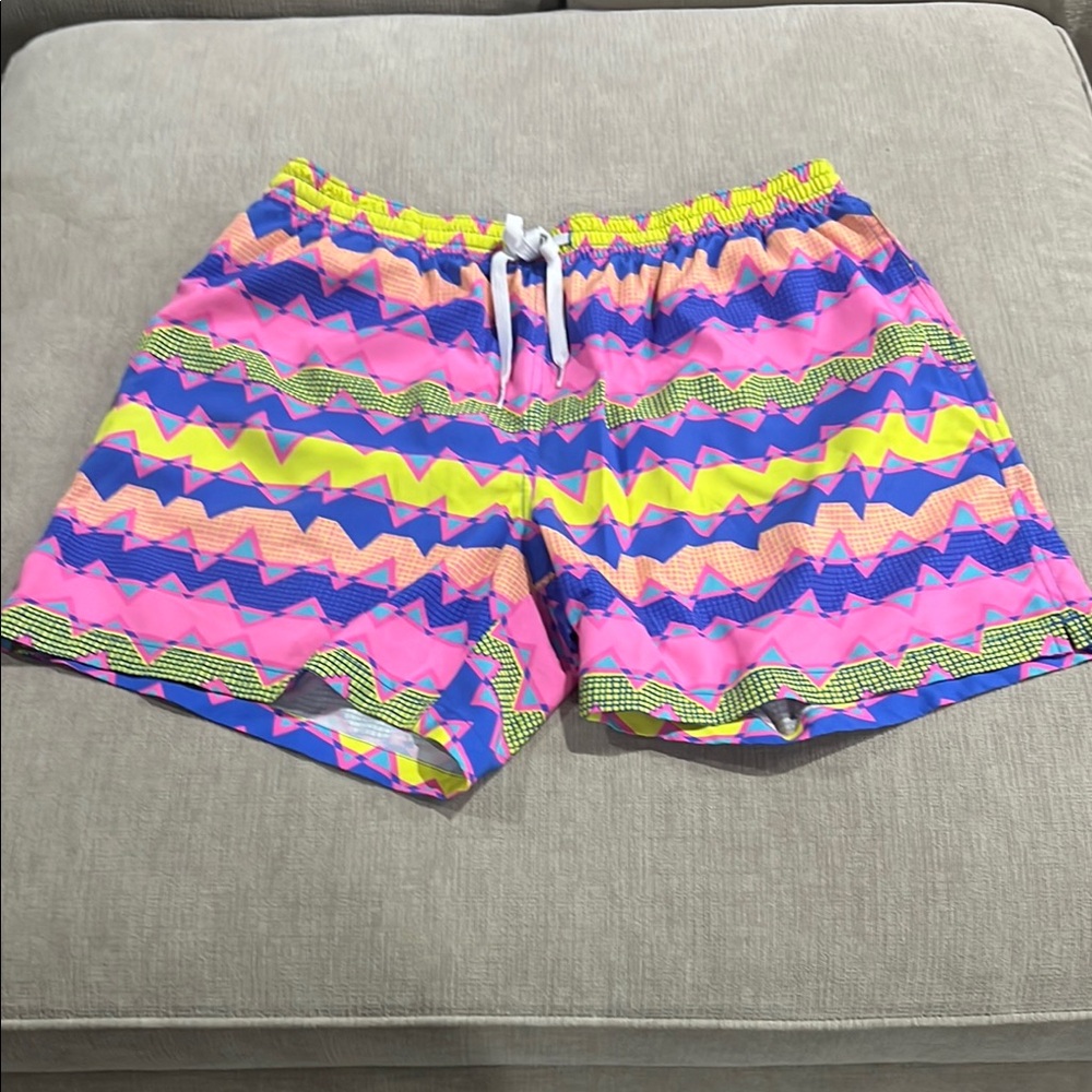 Chubbies Pink and Yellow Swim Trunks Vibrant Tie-Dye Style